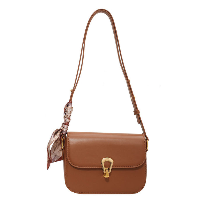 Wholesale Women Fashion Simple Solid Color Love Lock Saddle Shoulder Bag