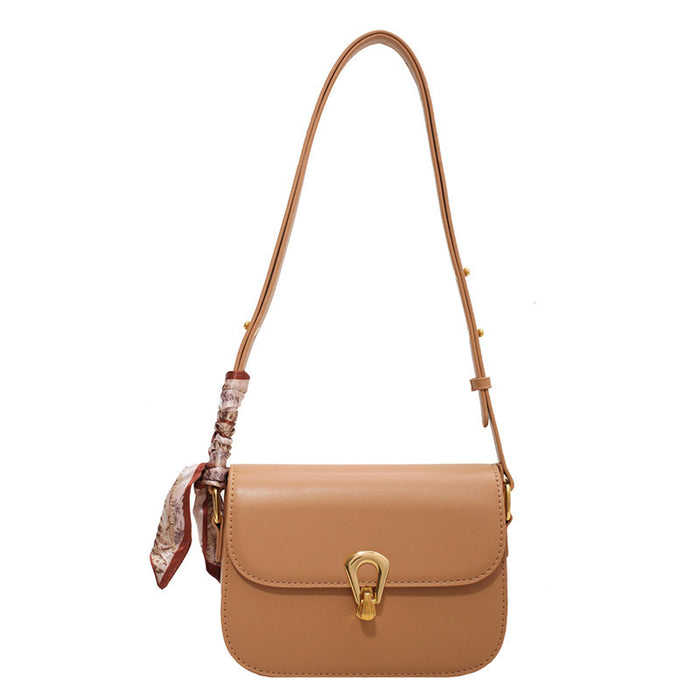 Wholesale Women Fashion Simple Solid Color Love Lock Saddle Shoulder Bag